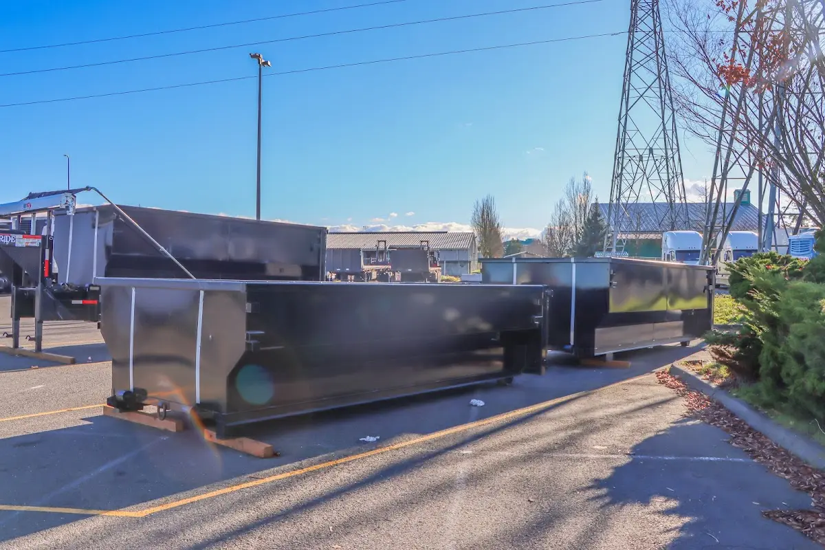 Roll-off dumpster ready for waste disposal at job site for 10 Yard Dumpster Rental in Henrietta